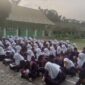 Pembacaan yasin rutin setiap Jumat dilaksanakan di SMP Negeri 9 Batanghari (Foto/Istimewa)